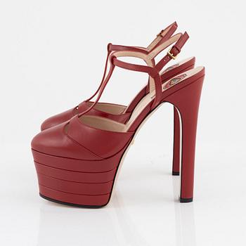 Gucci, a pair of red leather high heel shoes, 2016, size 37.