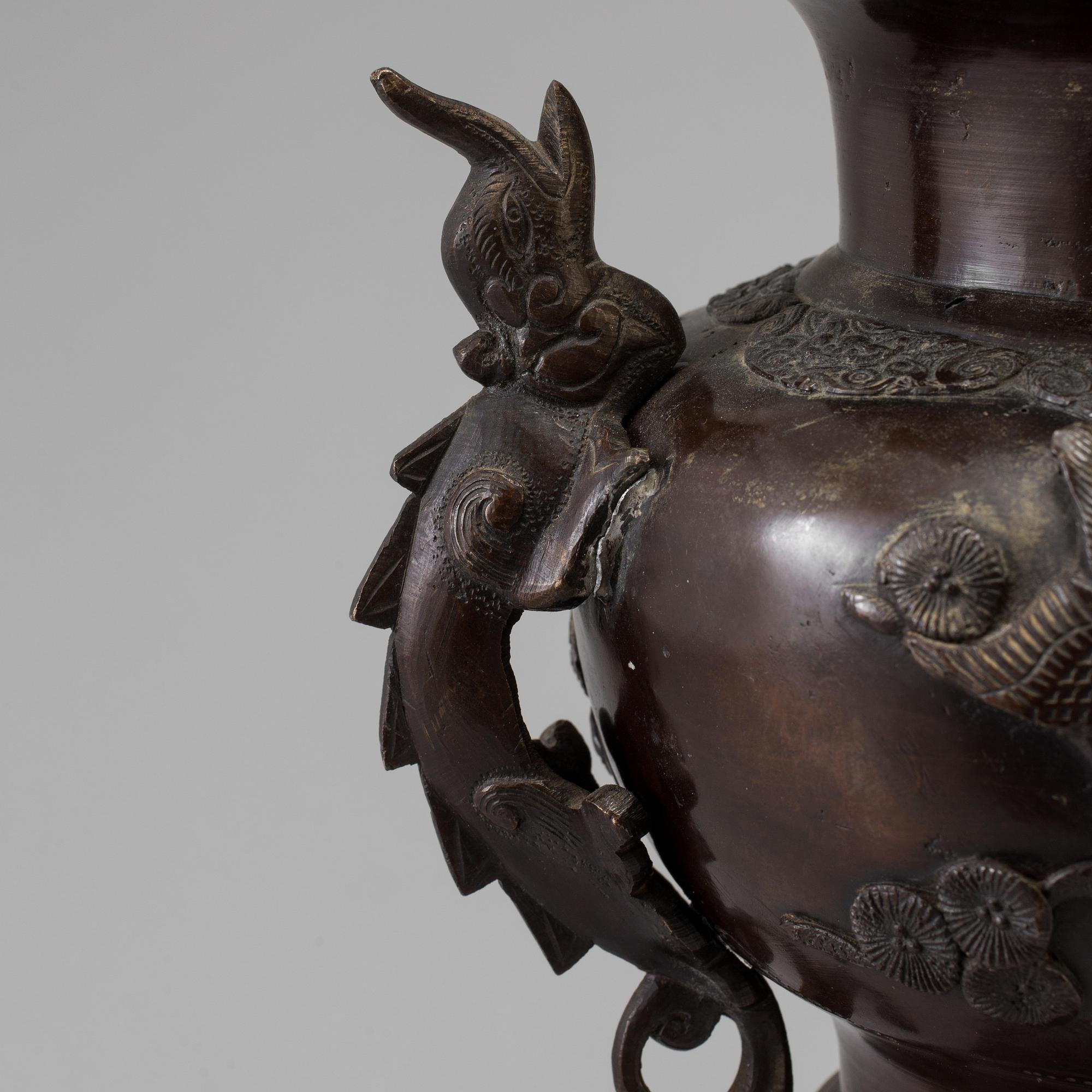 A Japanese bronze vase and cover, Meiji, late 19th century.