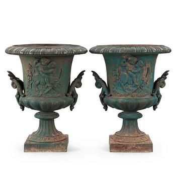 115. A pair of cast iron garden urns J&C G Bolinder No 24, around year 1900.