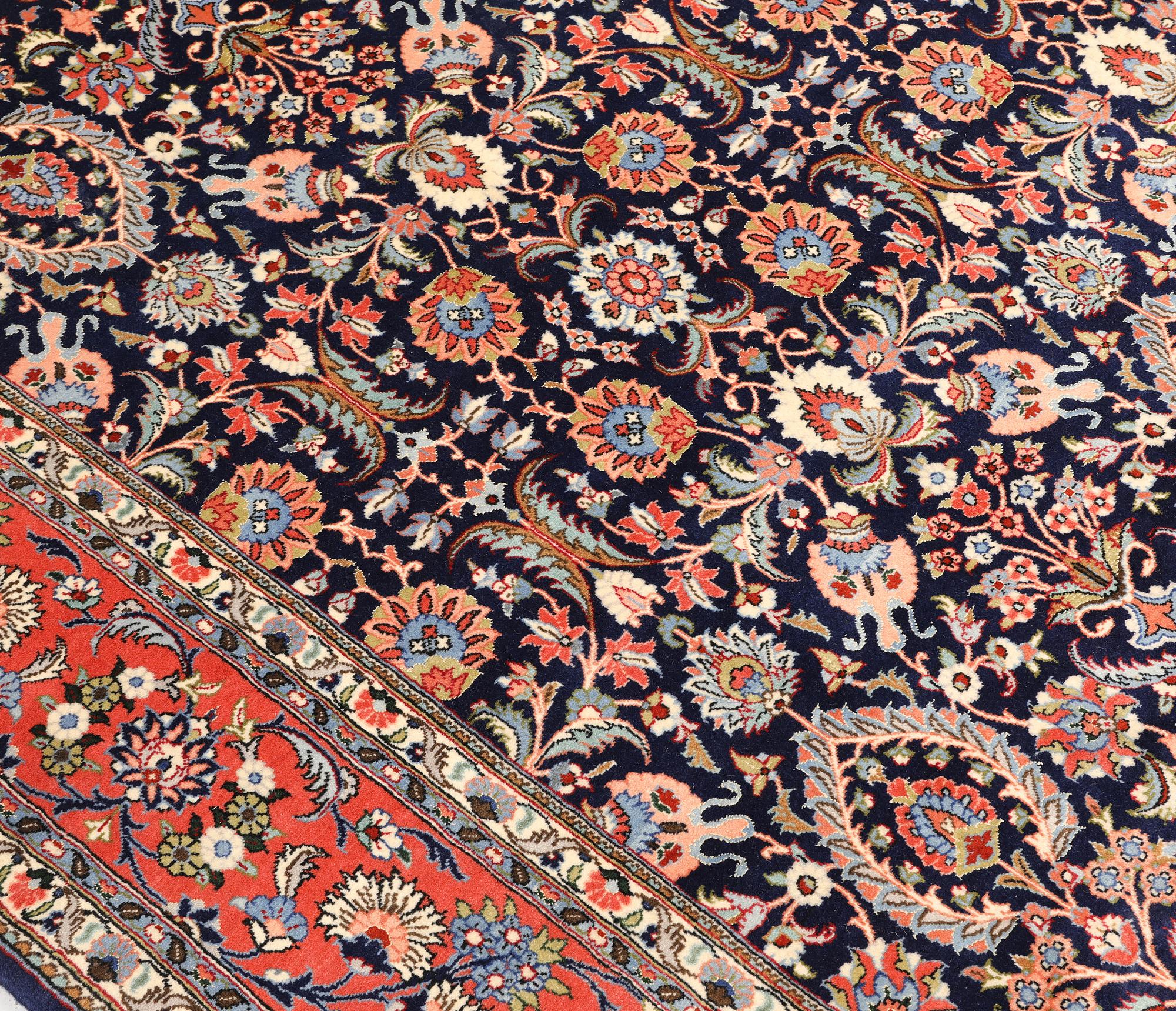 A part silk Sarouk rug, signed, approx. 240 x 208 cm.