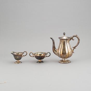 A silver coffee pot, creamer and sugar bowl. Kultakeskus Oy, Hämeenlinna, Finland 1943.