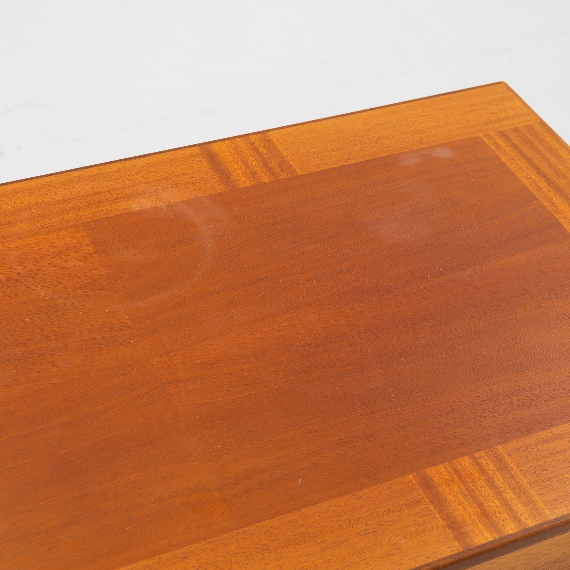 A 'Släden' nesting table by Carl Malmsten, Åfors möbelfabrik.