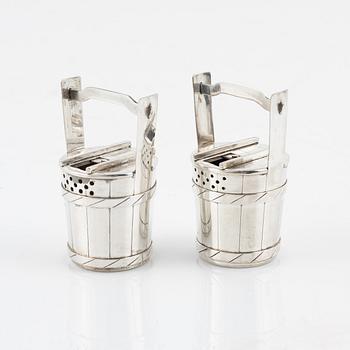 A pair of sterling silver salt- and pepper shakers , Japan, second half of the 20th century.