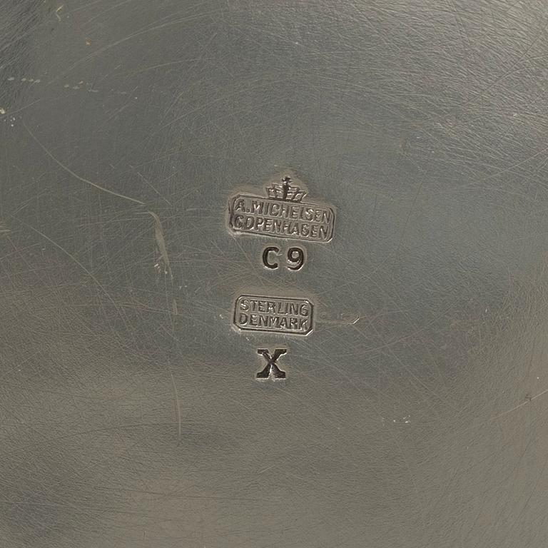 Three silver beakers, a vase and a cup, Sweden and Denmark, 19th-20th century.