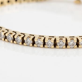 Tennis bracelet, 18K gold with brilliant-cut diamonds.