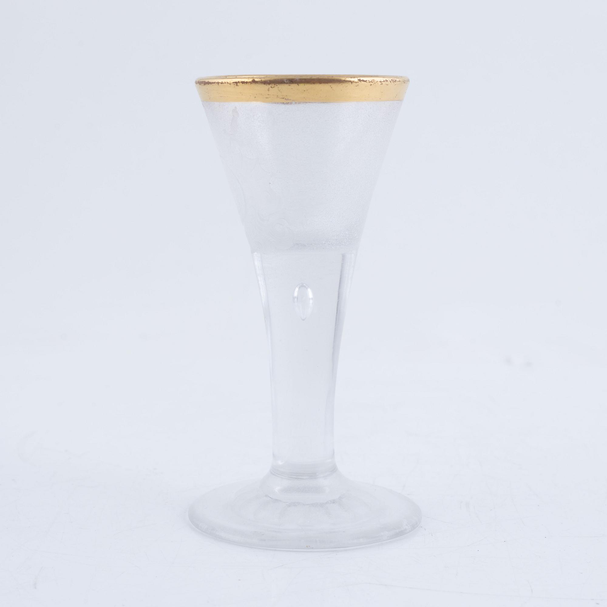 A presumably German engraved and gilt rococo glass, mid 18th century.