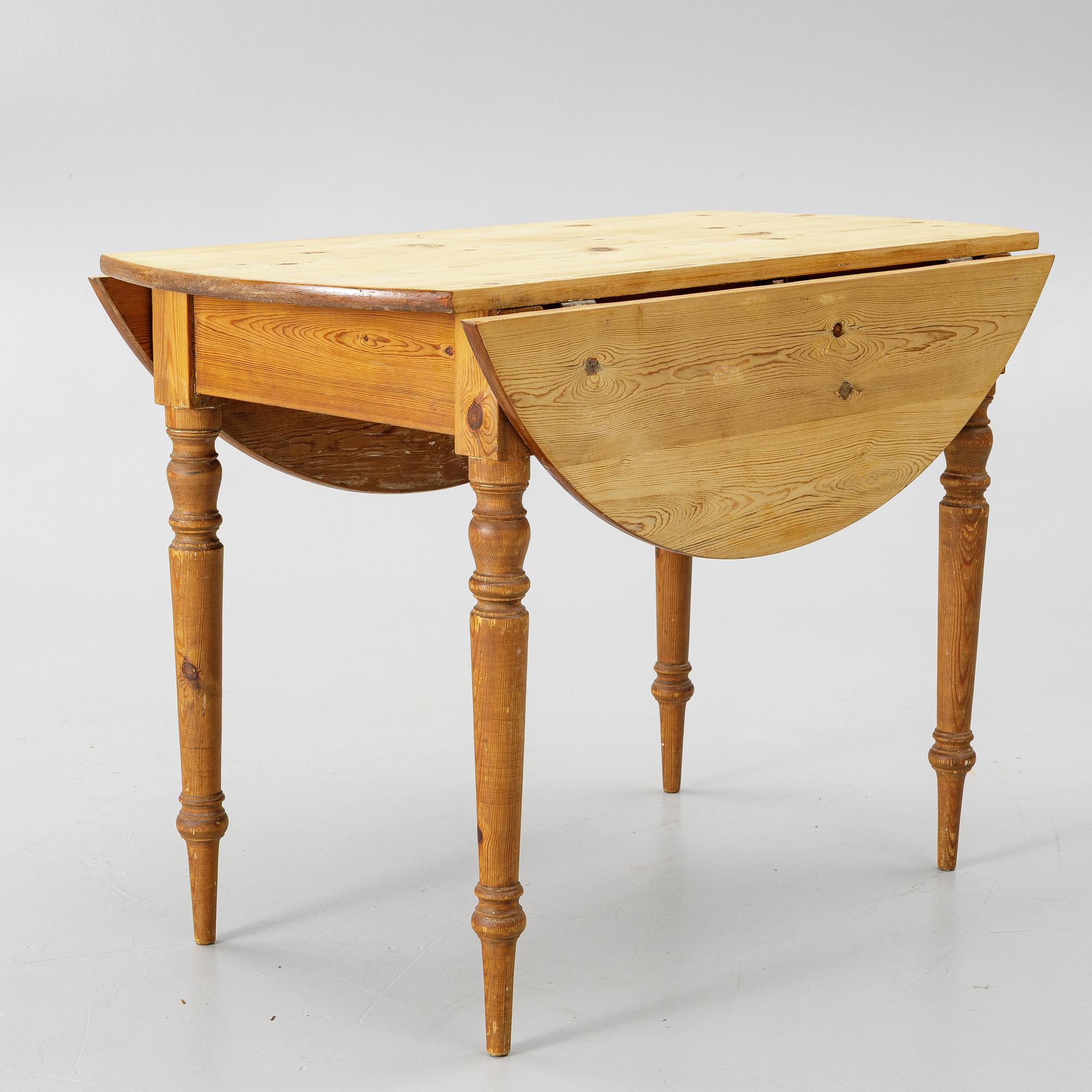 A folding table, early 20th Century.
