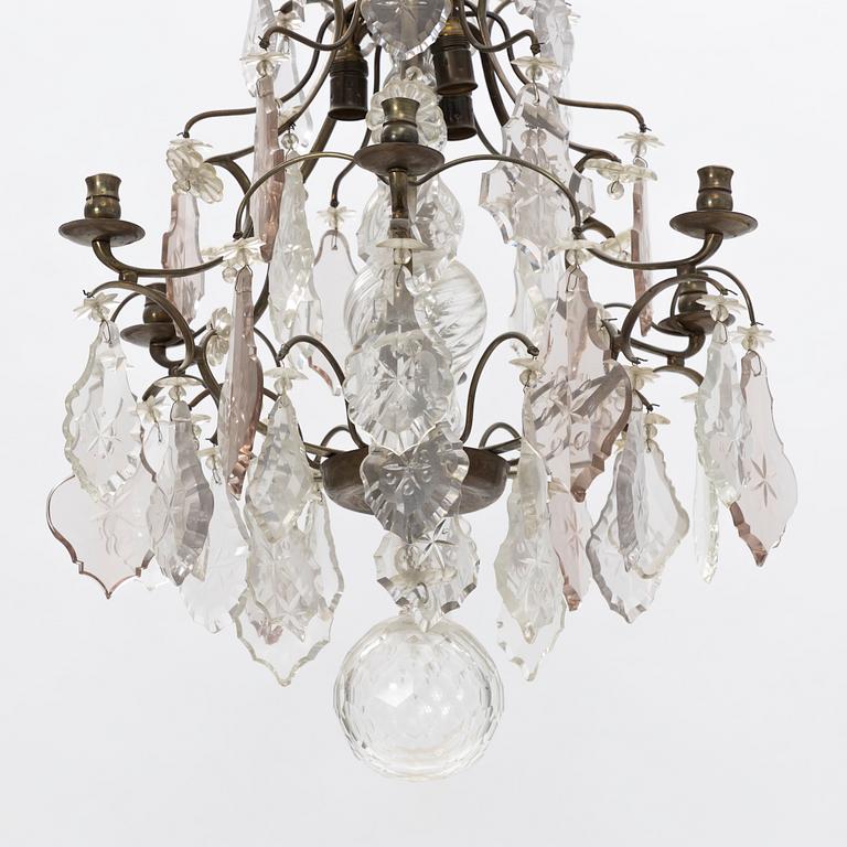 A six-light rococo-style chandelier, later part of the 20th century.