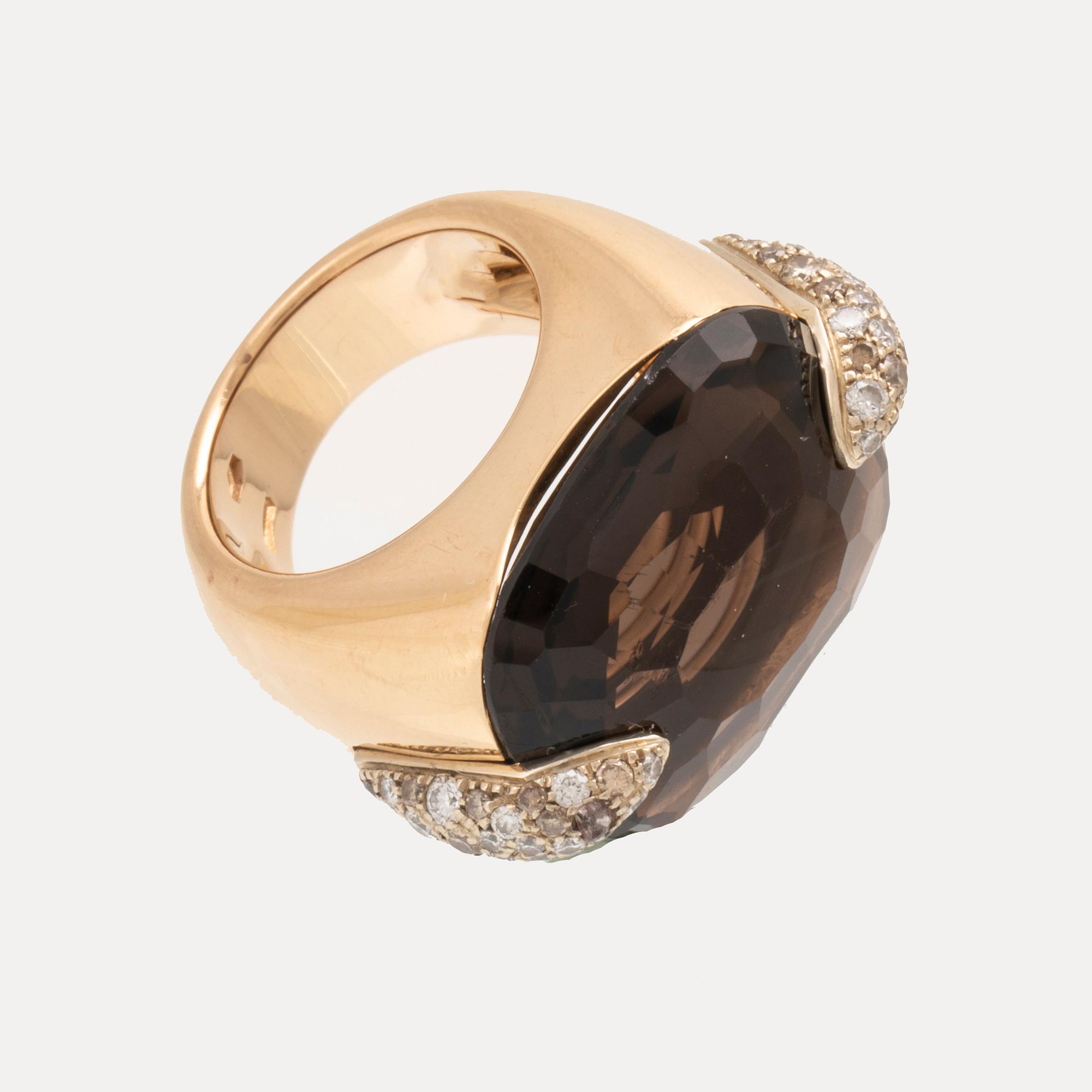 An 18K gold Pomellato "Pin Up" ring set with smoky quartz and round brilliant-cut diamonds.