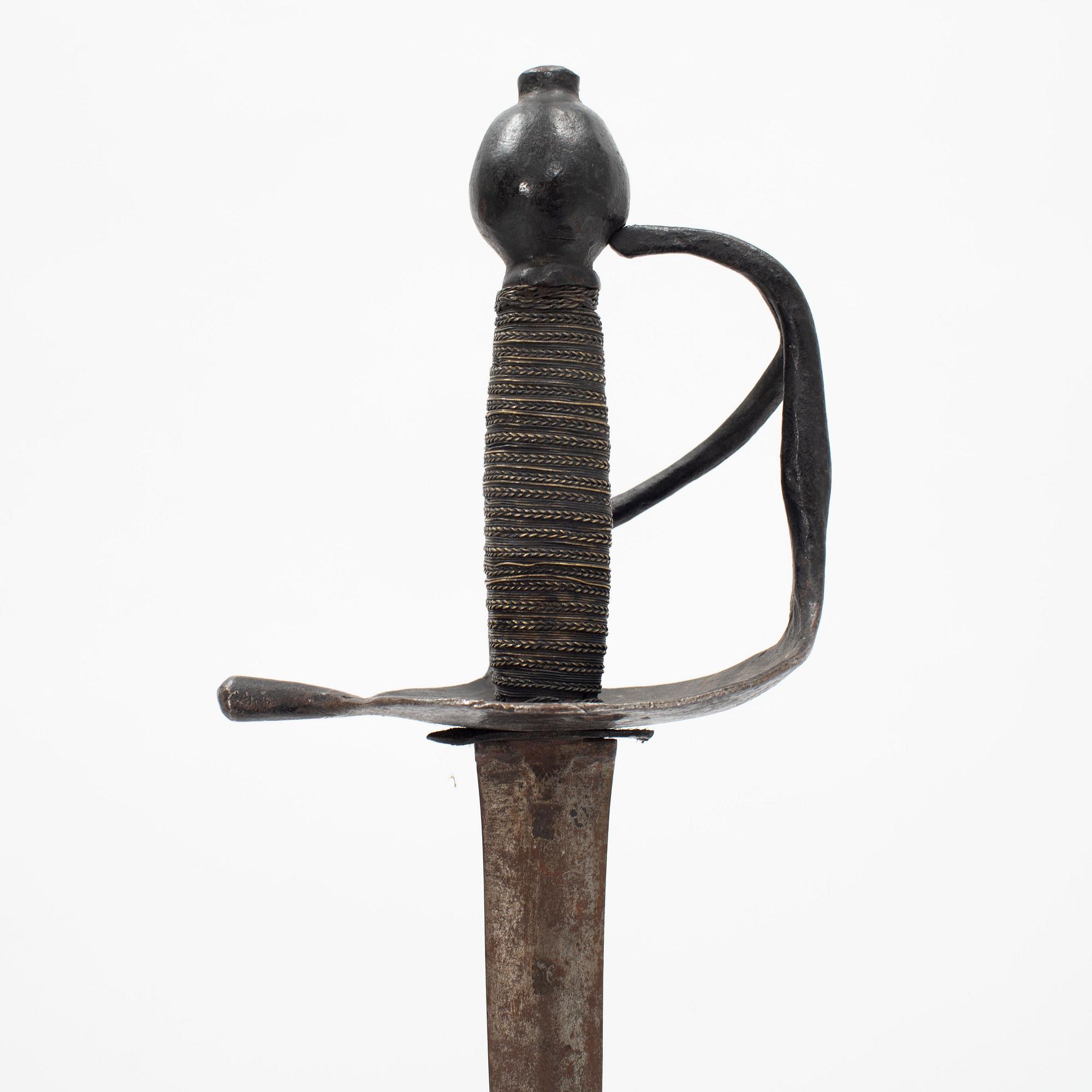A Swedish Navy cutlass 1832 pattern.