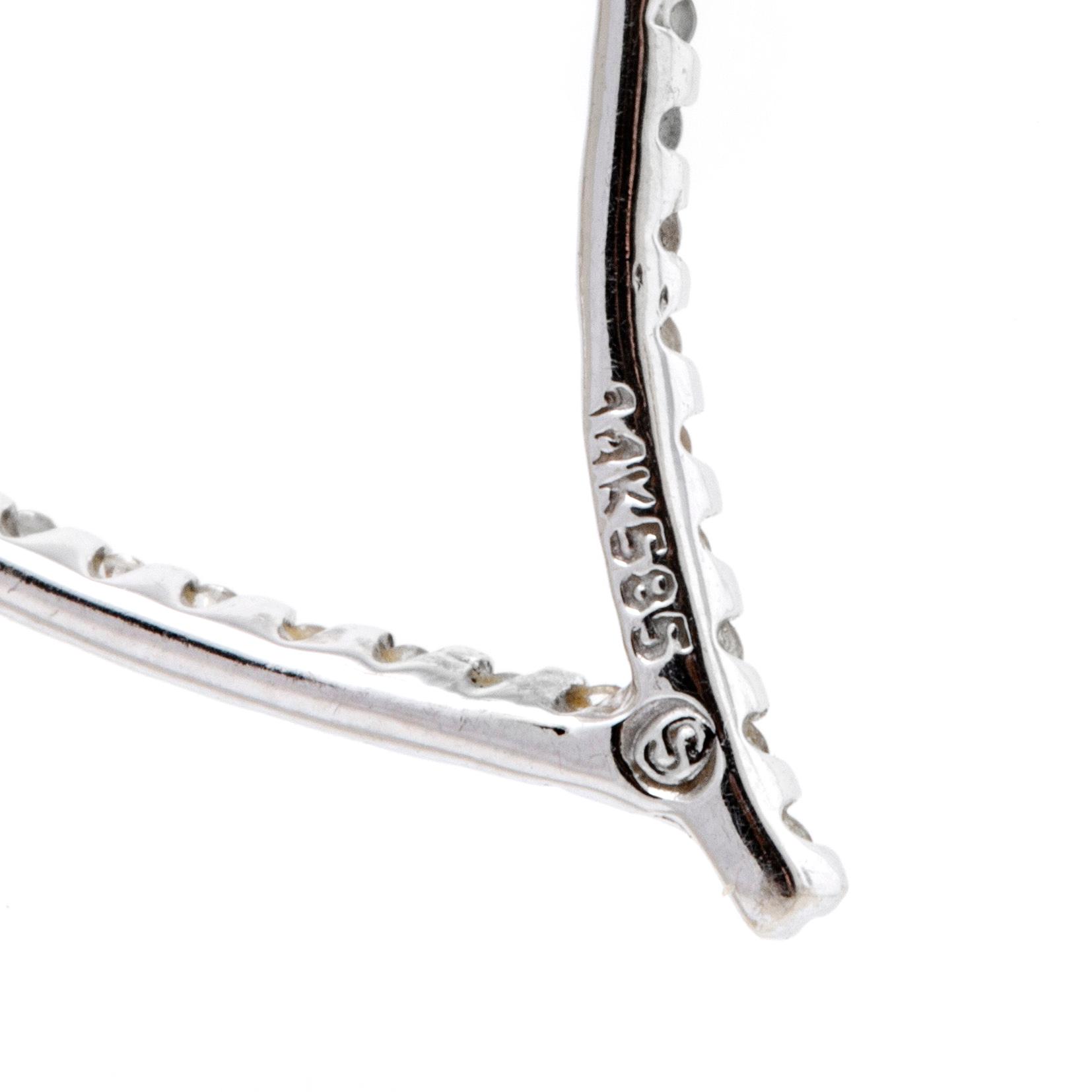 Pendant and chain, 14K whitegold brilliant-cut Diamonds, total length approx 48 cm.