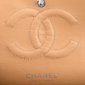 CHANEL, a beige caviar leather "double flap" shoulder bag.