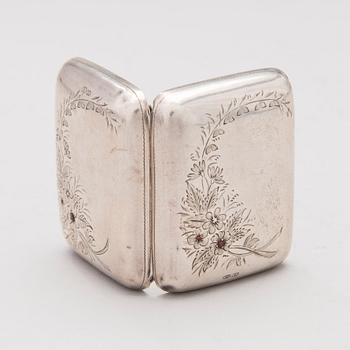 A silver case, Nikolai Kemper, and a pen and a paper knife in silver and enamel, import marks St Petersburg early 1900s.