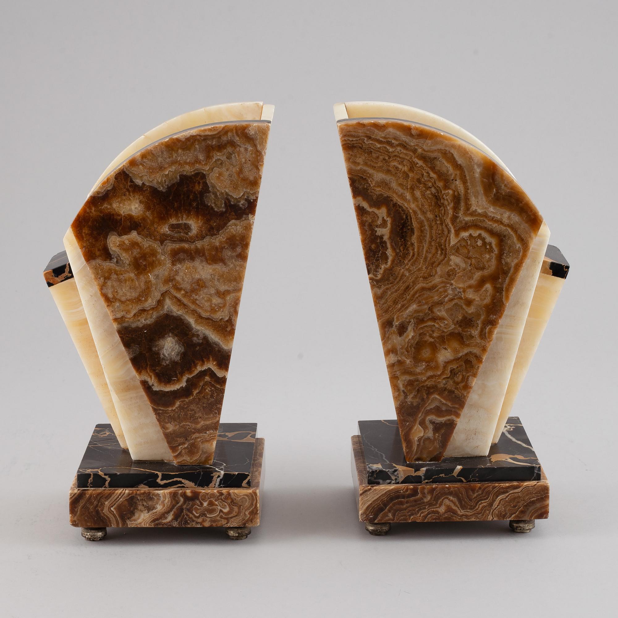 A three piece clock garniture, Art Deco style, 20th Century.