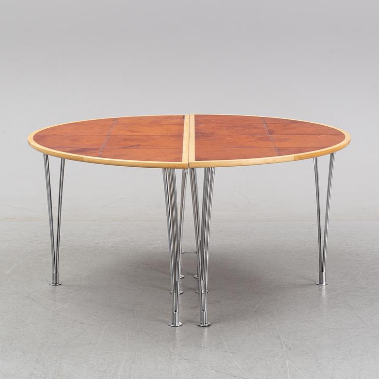 A birch and leather dining table in two parts, Mathsson International, 21th century.