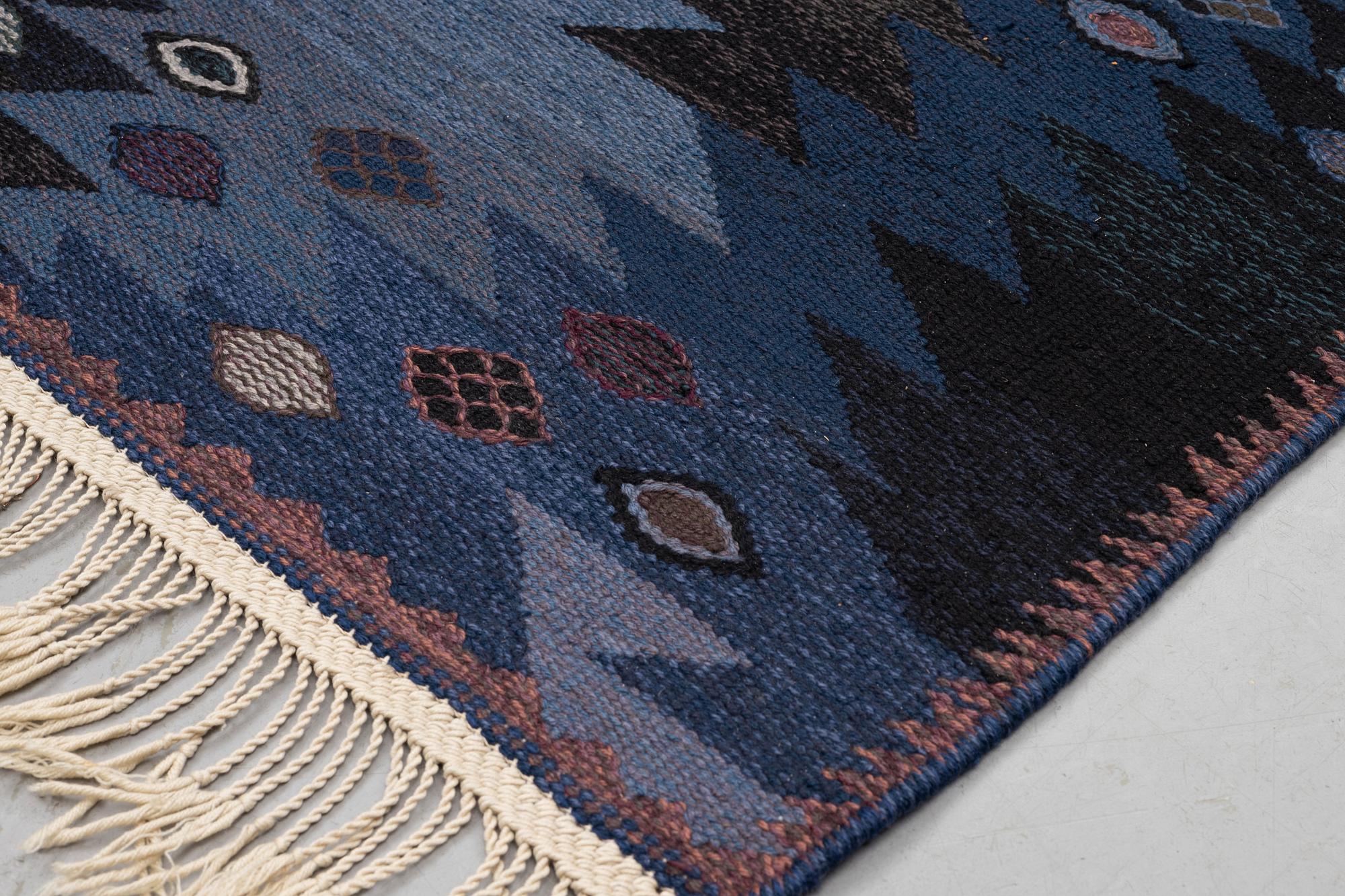 Barbro Nilsson, a carpet, "Tånga blå", flat weave, ca 243,5 x 173 cm, signed AB MMF BN.
