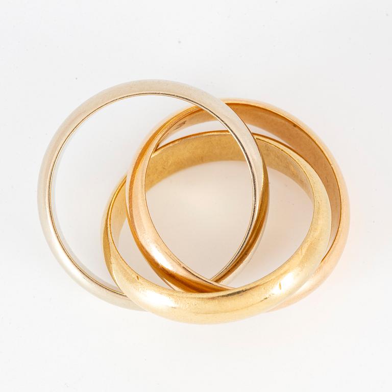 Cartier Trinity 18K gold ring.