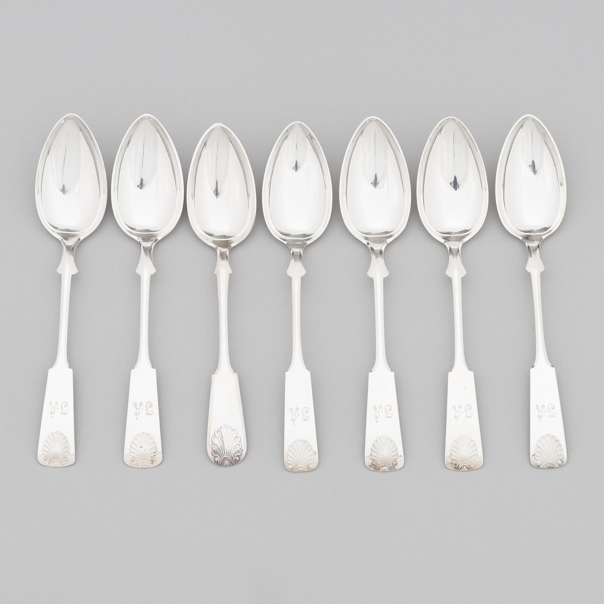A 42-piece set of silver cutlery with seashell decorated handles, Finnish hallmarks, 1918-1950.