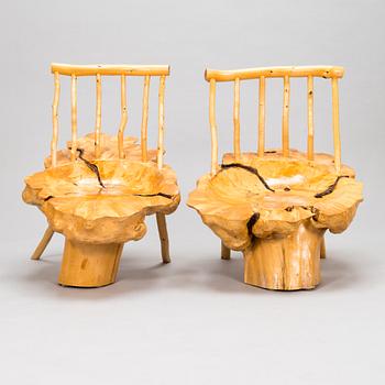 A pair of mid-20th century burr wood easy chairs made by  Johannes Järvelä, Finland.