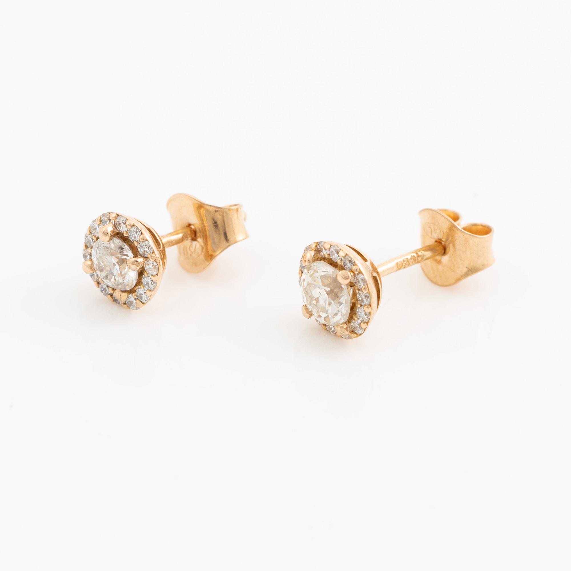 Earrings 18K gold with old-cut diamonds and side stones of brilliant-cut diamonds.