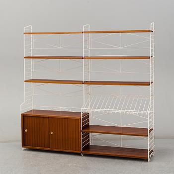 A 'String" bookcase, designed by  Nils Strinning,