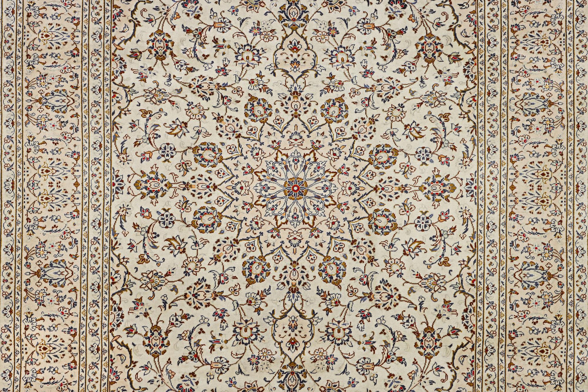 A Kashan carpet, c. 359 x 250 cm.