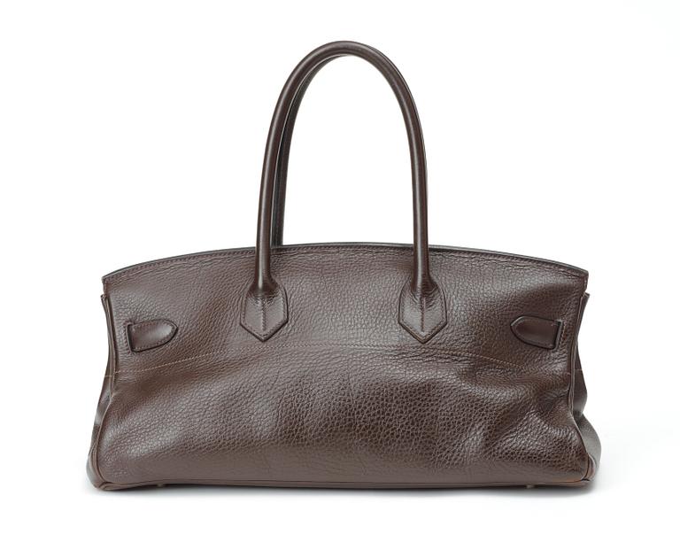 A handbag "JPG Shoulder Birkin 42 Taurillon Clémence" by Hermès.