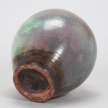 Heidi Blomstedt, a red clay floor vase, signed and dated -36.