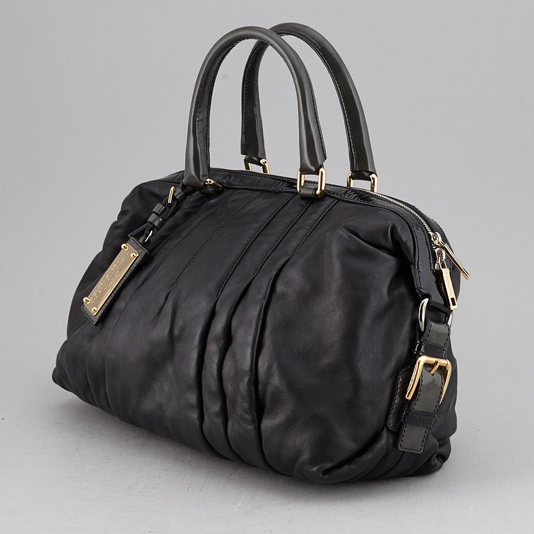 DOLCE & GABBANA, a black leather bag.