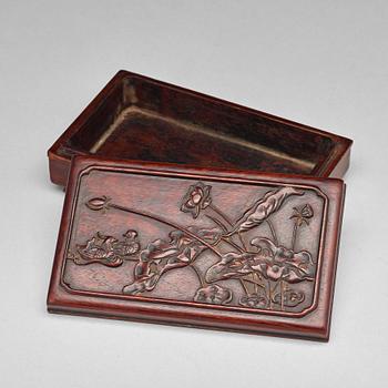 635. A Chinese wooden box, circa 1900.