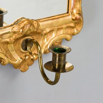 A Rococo mirror sconce, 18th Century.