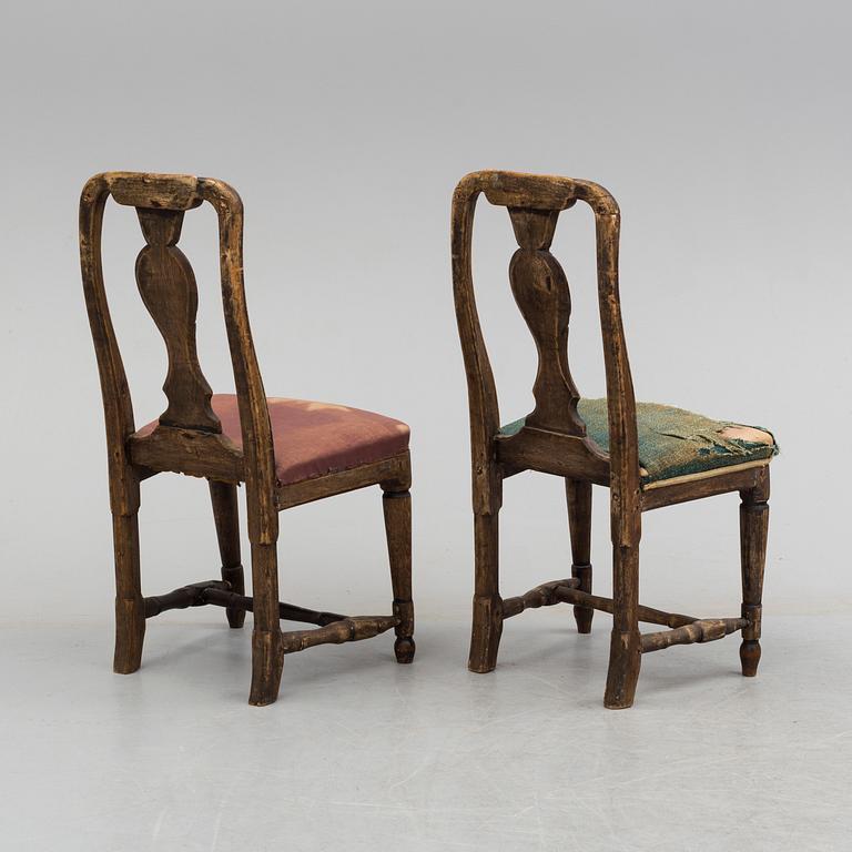 A pair of 18th century chairs.