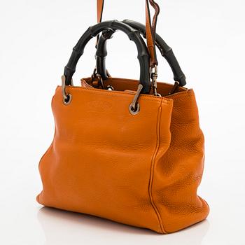 Gucci, a 'Small Bamboo Shopper' bag.