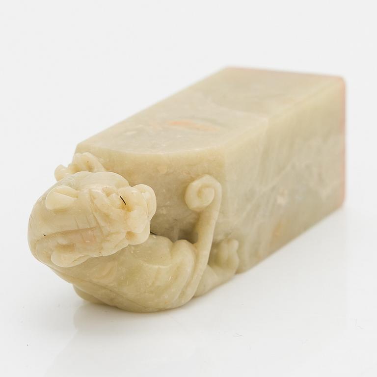 A Chinese seal, green stone, 20th century.