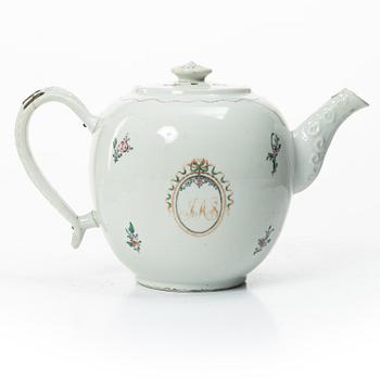 Cups and saucers, 11+7, and a teapot in famille rose with monogram, company porcelain, China, 18th century.