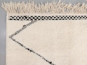 A moroccan carpet, ca 300 x 200 cm.