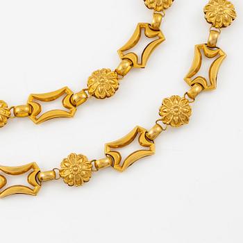 A necklace and a pair of earrings 18K gold, 19th century.