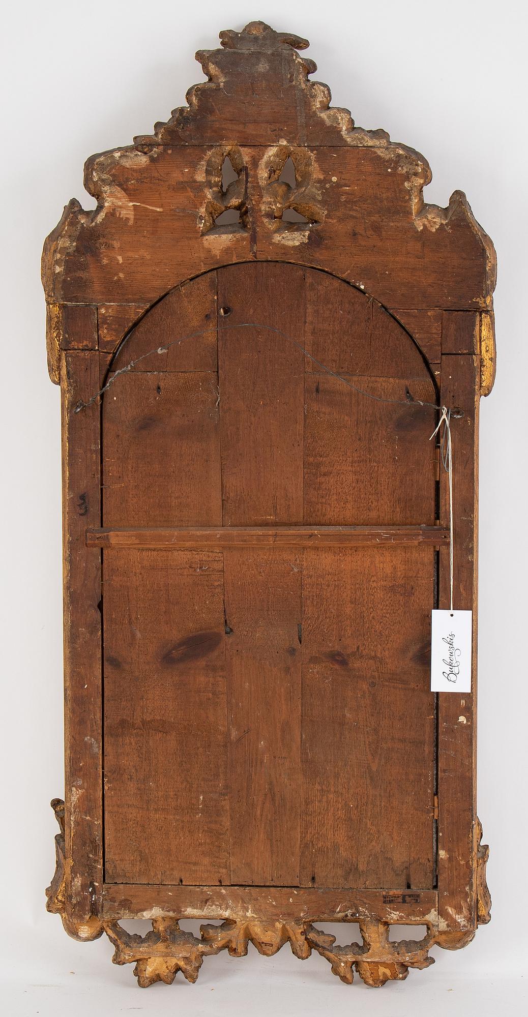 A gilt mirror, Stockholm, second half of the 18th Century.