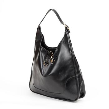 477. A 1970s black leather handbag "Trim Bag" by Hermès.