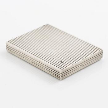 Puderdosa, silver samt guld. Med dekor av fåglar och rosa stenar.