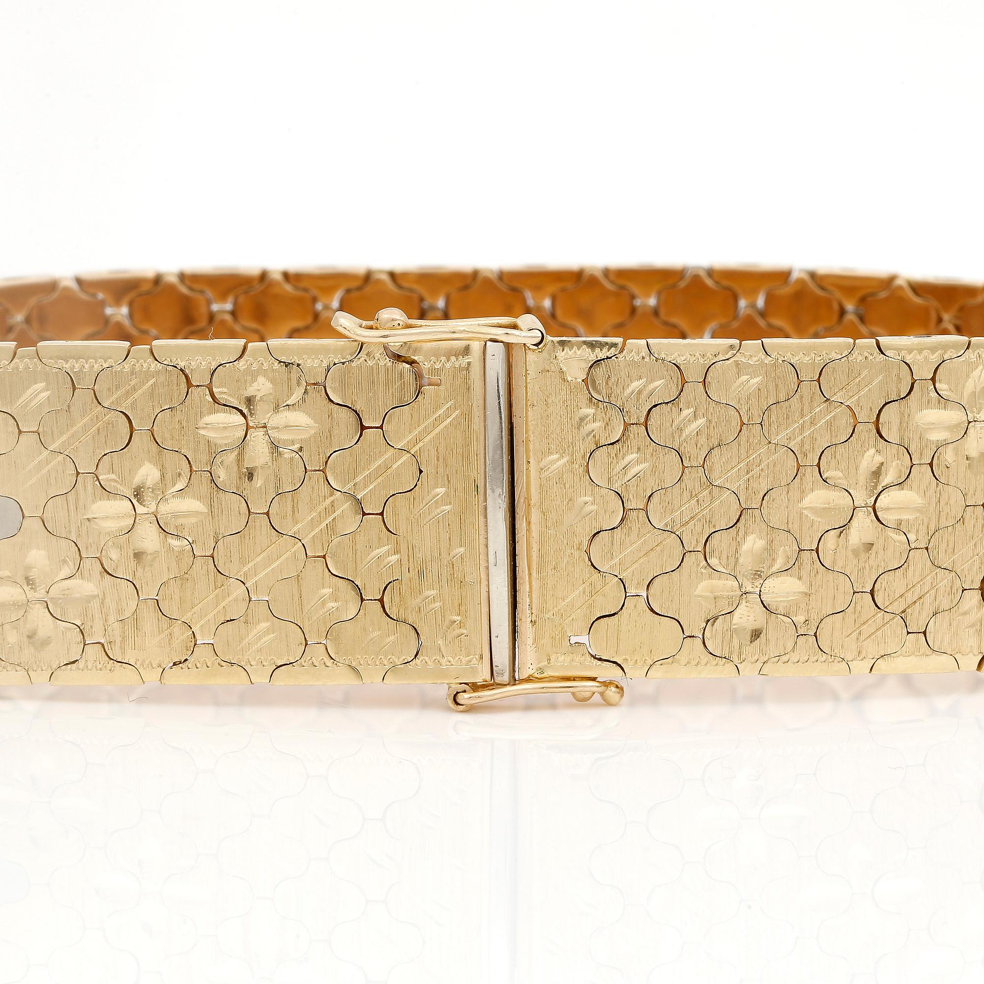 ARMBAND, tvåfärgat 18K guld, Vincenza, Italien, 1900-talets sista kvartal. Total vikt 57 g.