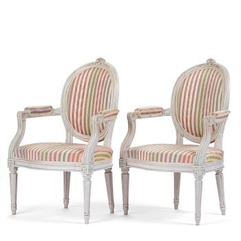 66. A pair of Gustavian open armchairs by E. Öhrmark (master in Stockholm 1777-1813).