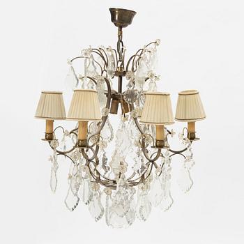 A rococo style chandelier, early 20th Century.