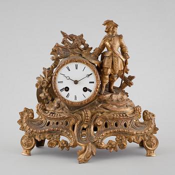 A Louis XV style table clock from P H Mourey, early 20th century.