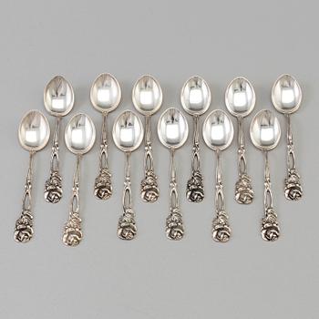 12 silver coffee spoons, import marks for Malmö, Sweden, 20th century. Weight ca 123 grams.