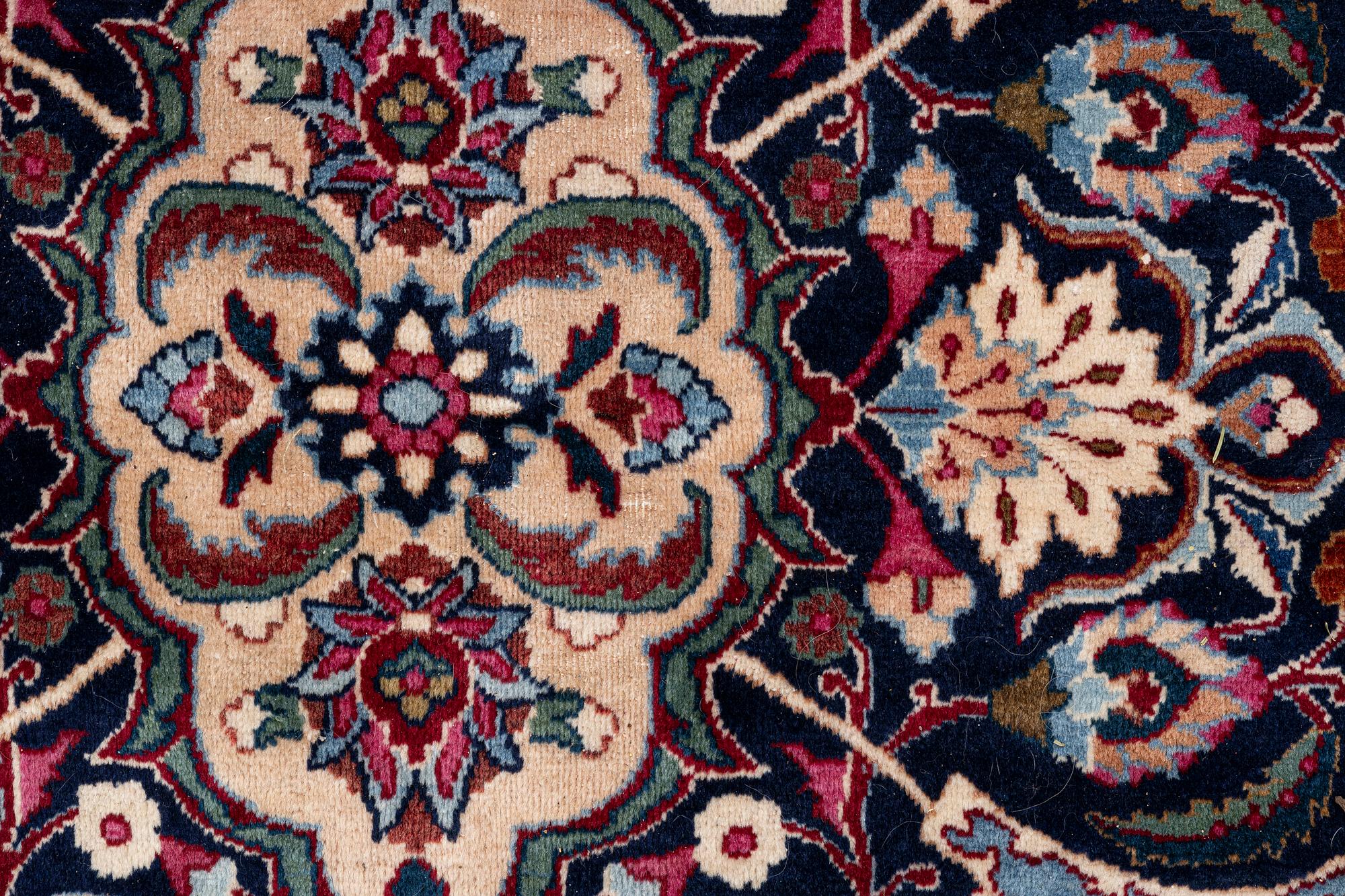 A oriental carpet, c. 375 x 290 cm.