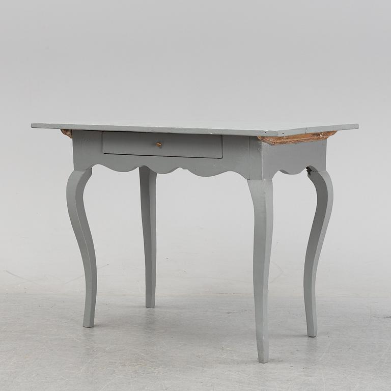 A painted rococo table, 18th Century.