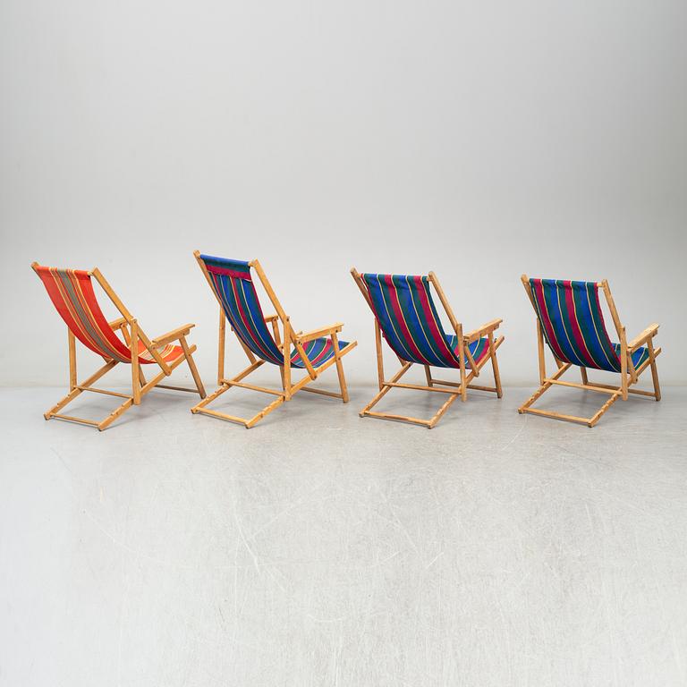 Four collapsible birch deck chairs, mid-late 20th Century.