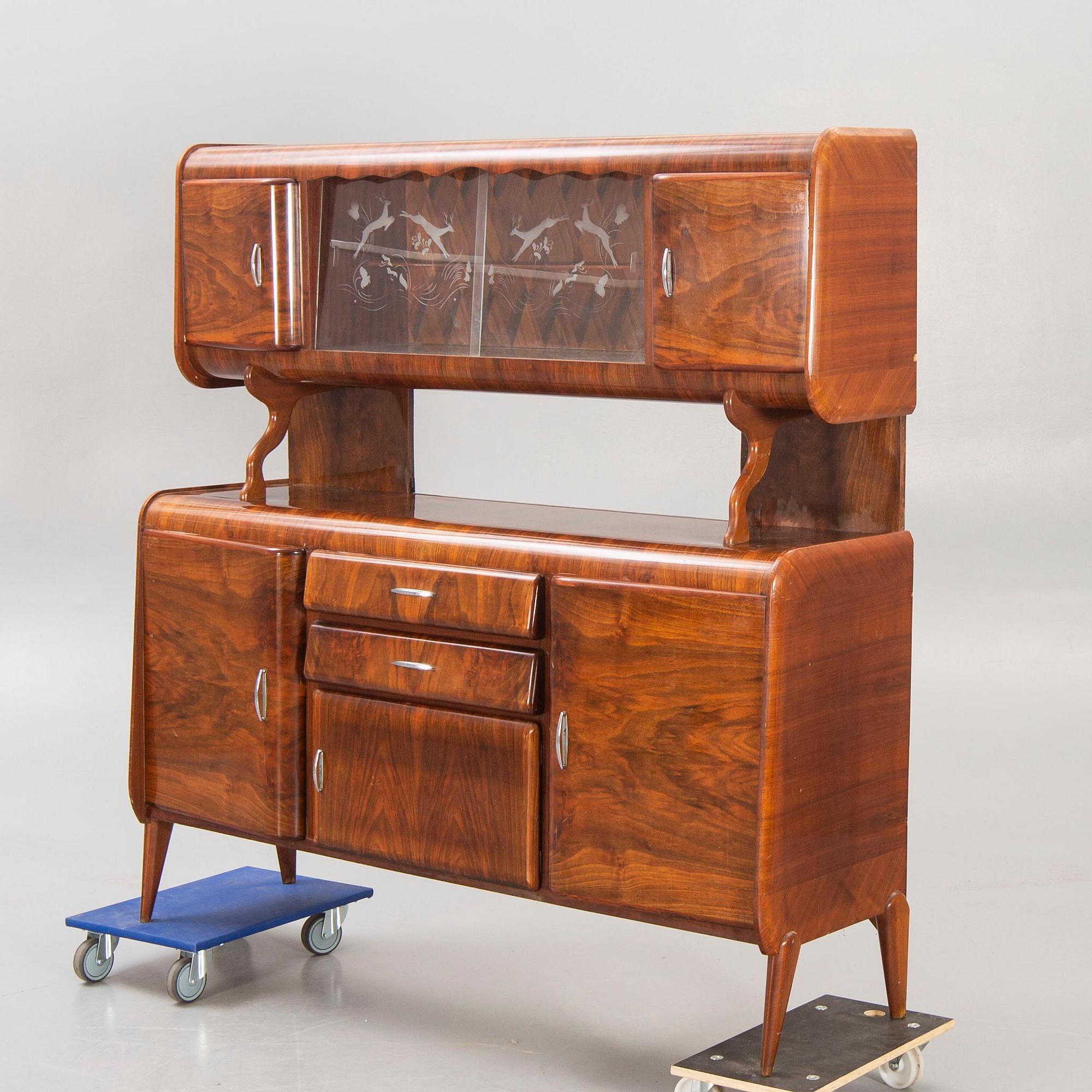 An Italian 1950s walnut sideboard.