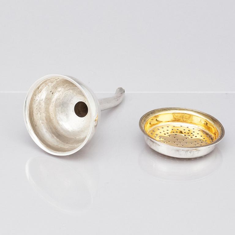 A Swedish 19th century parcel-gilt silver wine-strainer, mark of Johan Petter Grönvall, Stockholm 1822.